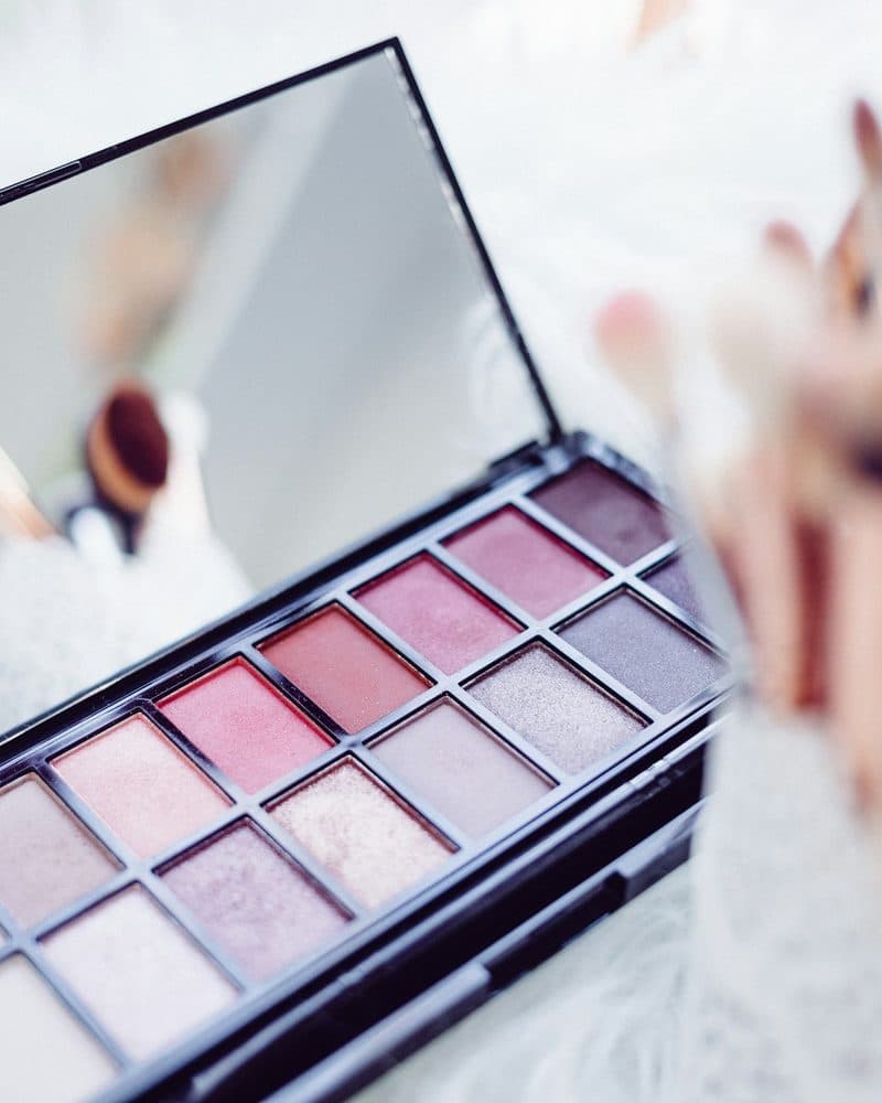 Handcrafted artwork with cultural motifs and warm tones